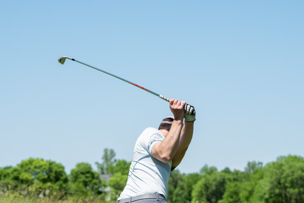 Sumber: https://unsplash.com/photos/man-in-white-tank-top-and-white-shorts-playing-golf-during-daytime-R9EjtOI8w7A